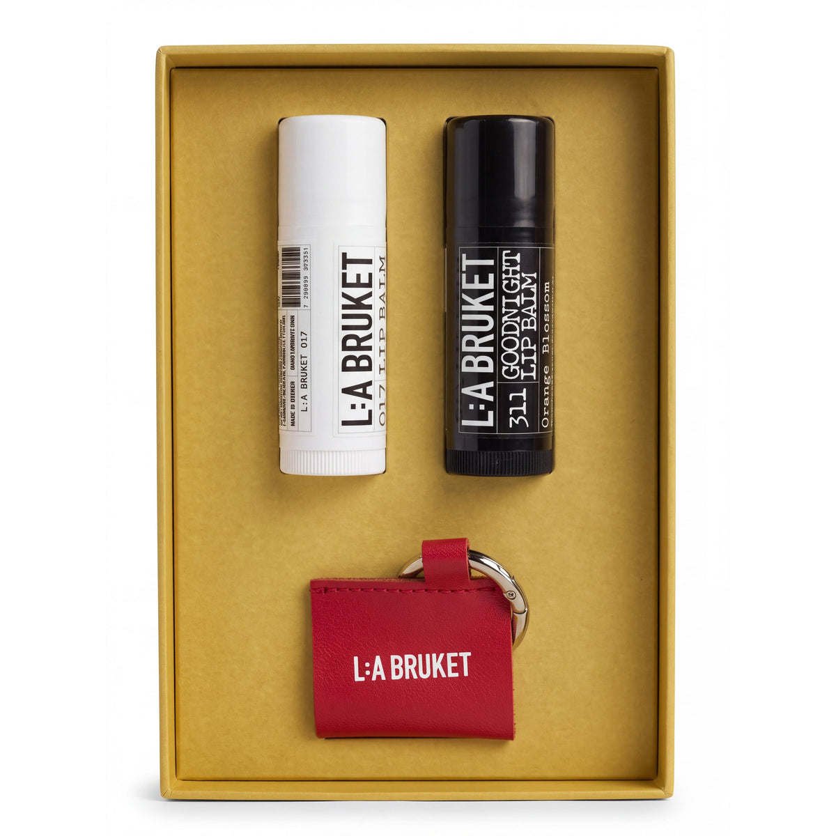 L:A Bruket Little Traveler Winter Kit - No. 017 Almond Coconut 14 g Lip Balm, No. 311 Goodnight 14 g Lip Balm, Lip Balm Holder-L:A Bruket-Oak Manor Fragrances
